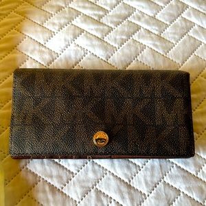 Michael Kors wallet lot of room for you cards.